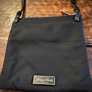 Dooney & Bourke Black Messenger Bag with Minimalist Design